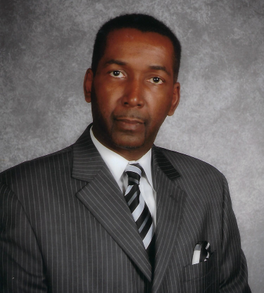 Derek W. Jordan, Ed.D. in professional attire